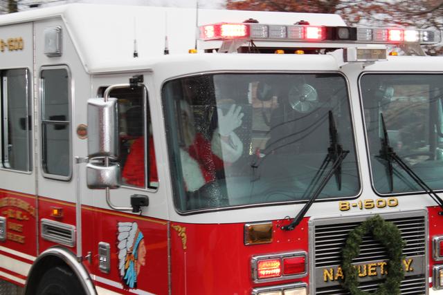 Children's Christmas Party at 8-100. 12-9-2012. Santa pays a visit . Photo by Vincent P. Tuzzolino